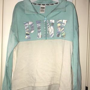 Pink color block quarter zip with holographic logo